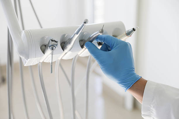 Professional Tooth Extraction technician working in Carnegie, OK